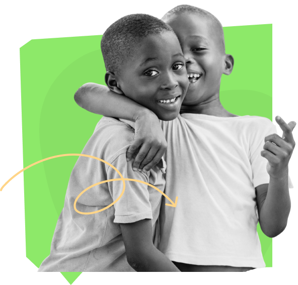 Two children hugging and smiling